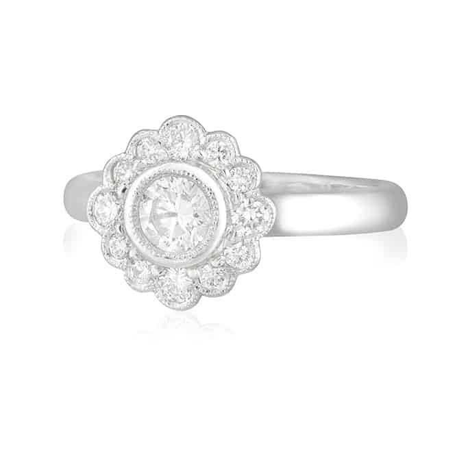 Round Bezel Diamond Daisy Ring
