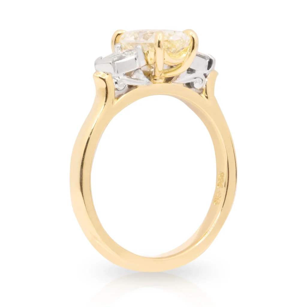 Oval and Bullet Diamond Trilogy Engagement Ring