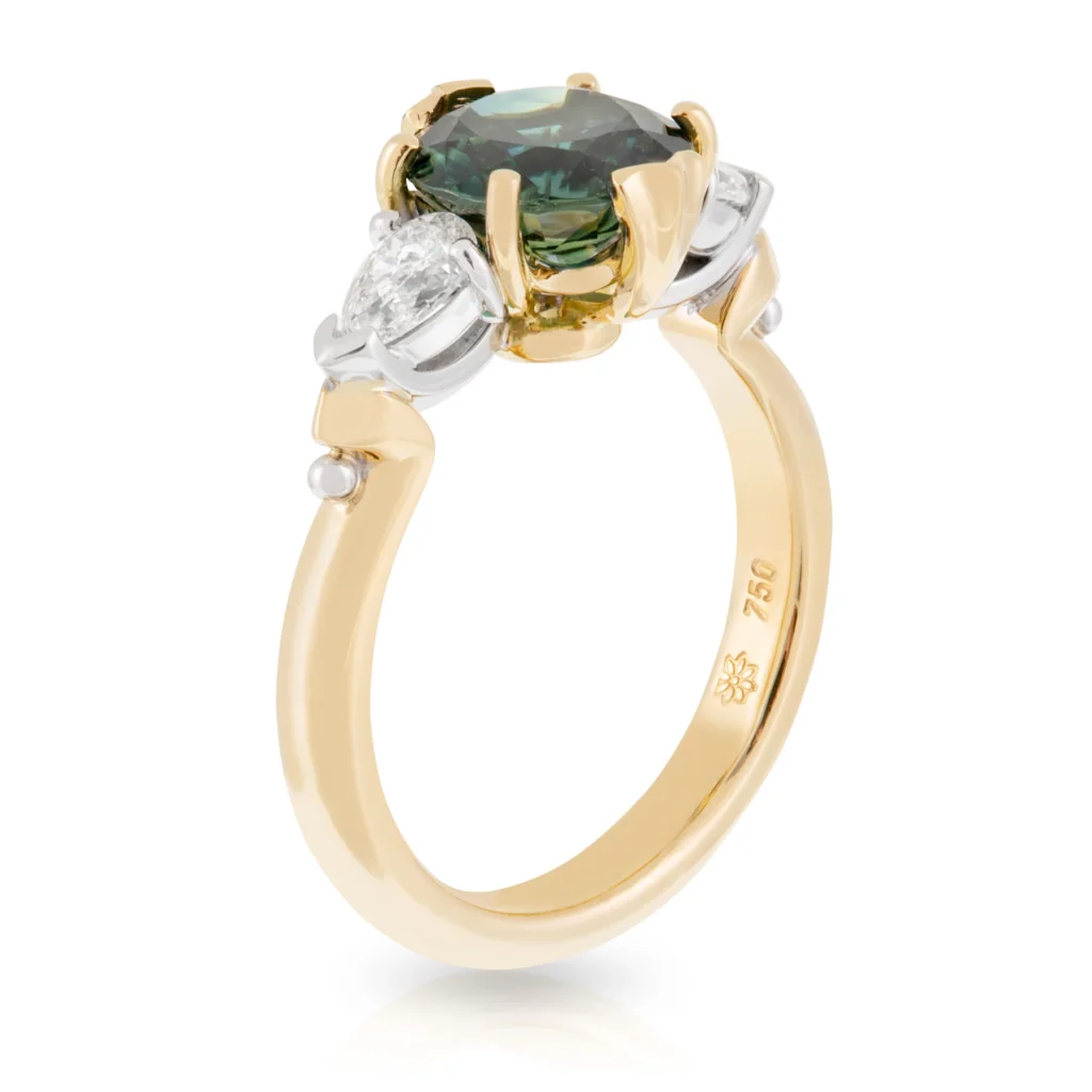 Sapphire and Pear Diamond Trilogy Engagement Ring