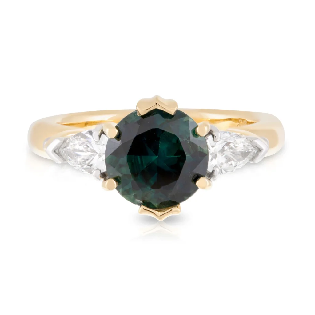 Sapphire and Pear Diamond Trilogy Engagement Ring
