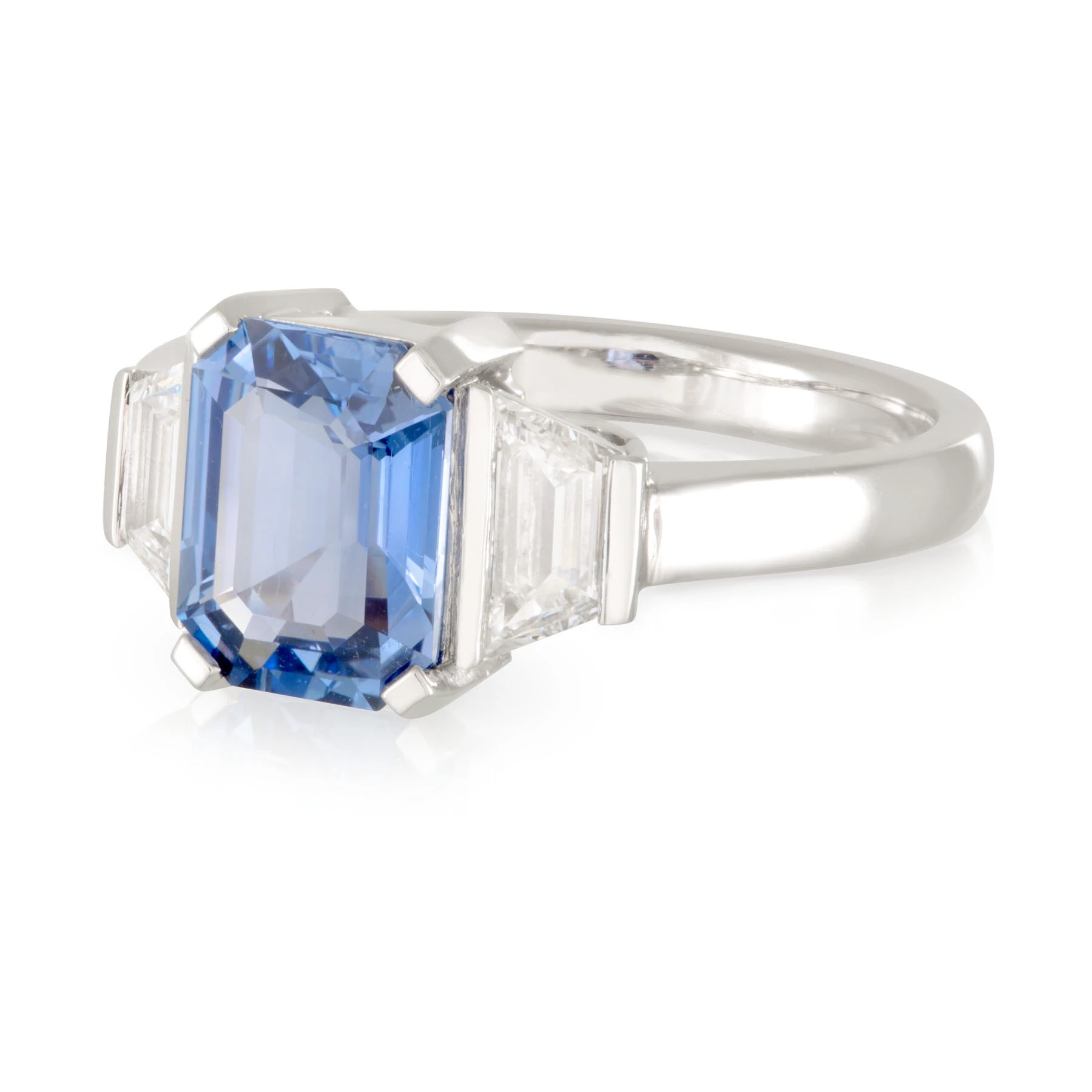 Sapphire and Trapezoid Diamond Trilogy Engagement Ring